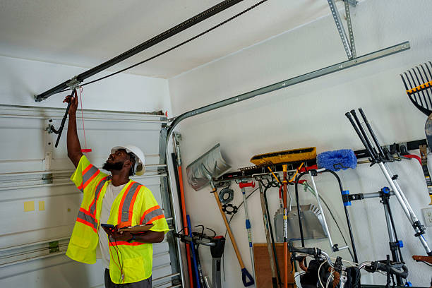 Professional Garage Door Maintenance technician working in East Marion, NY